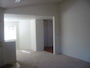 Turning to the left, a view of the dining area and entry to the kitchen.