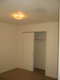 The first bedroom to the right of the bathroom.