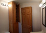 View of the linen closet from the bathtub