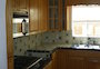 View to the dacor range and kitchen sink (with filtered water)